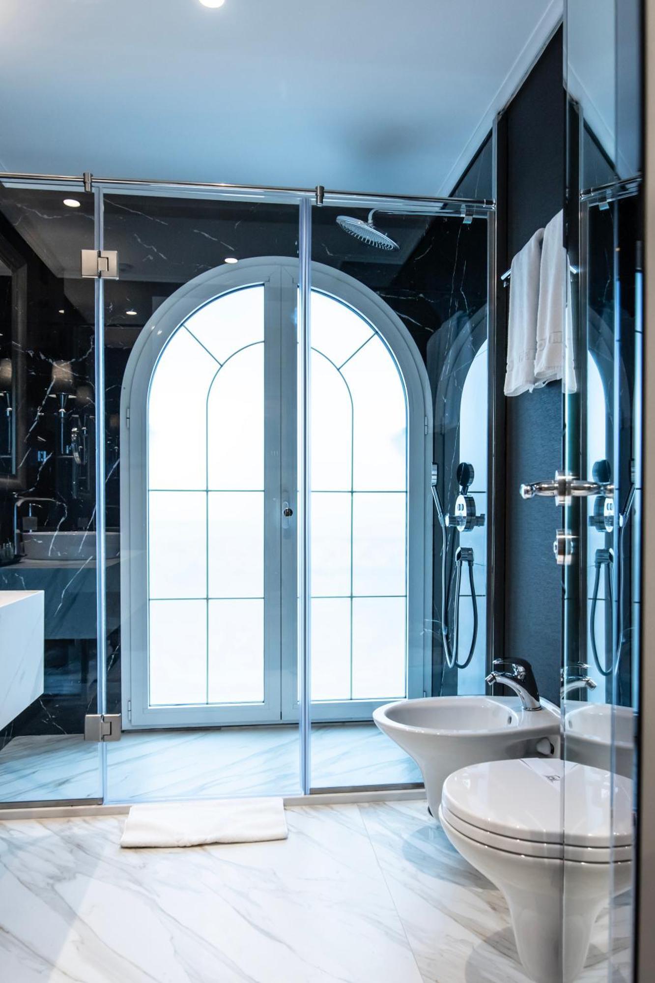 Xheko Imperial Luxury Hotel & Spa Tirana Exterior photo A modern bathroom