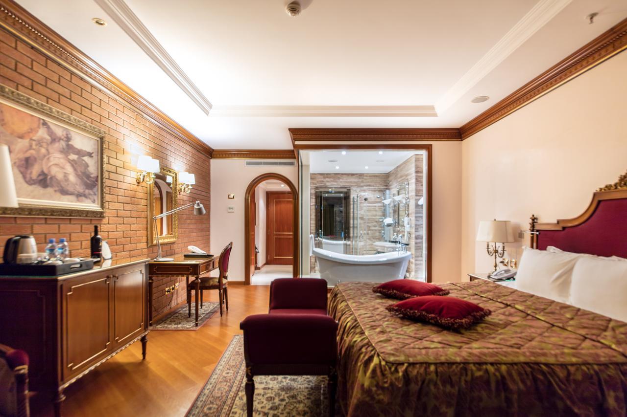 Xheko Imperial Luxury Hotel & Spa Tirana Exterior photo A room at the hotel
